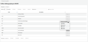 Tableau des grilles de catalogage, le bouton Actions à droite de la grille Livre numérique est cliqué et le curseur est sur l'option Structure MARC.